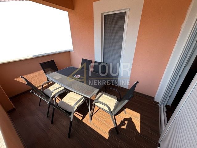 Stan u Dobrinju, 56.88m², 2 sobe
